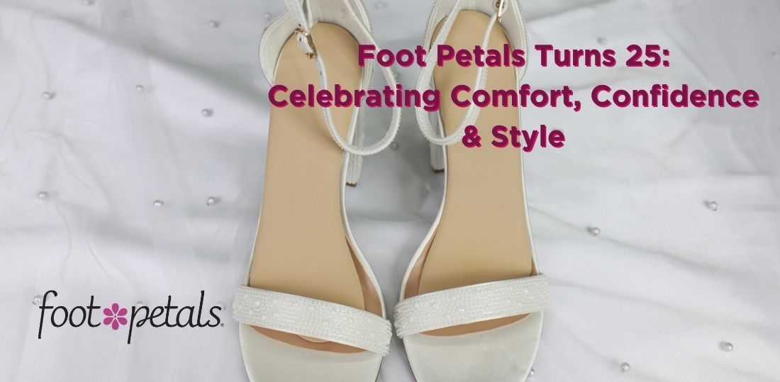 Cream and white strappy shoes on a white backdrop