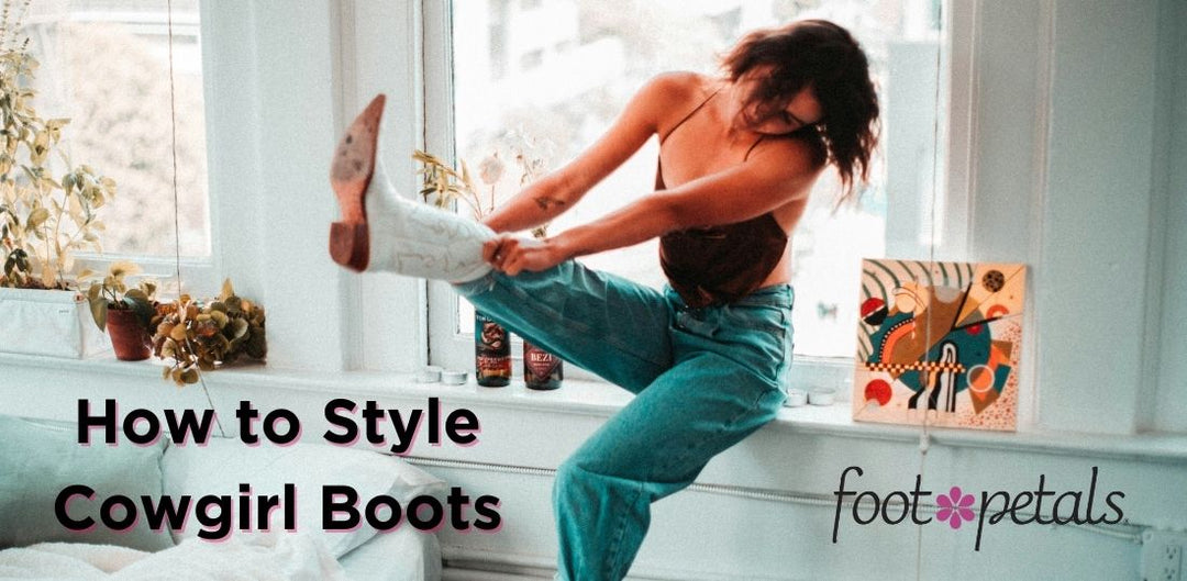 Woman sitting on windowsill, putting on white cowgirl boots
